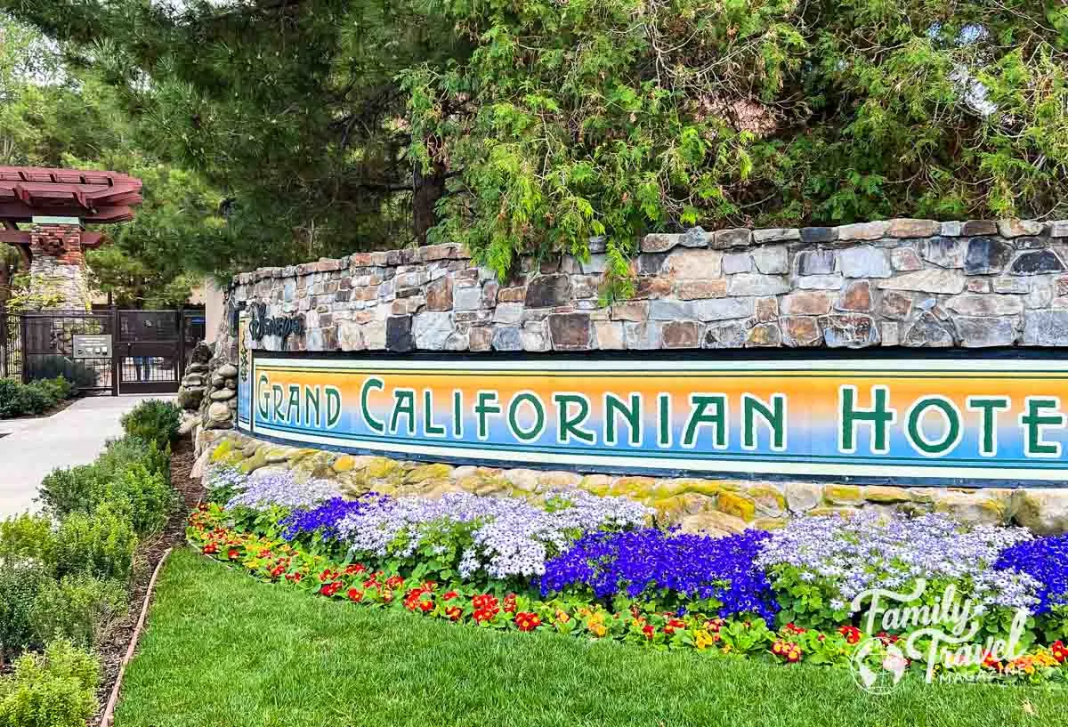 Entrance sign of Grand Californian with flowers