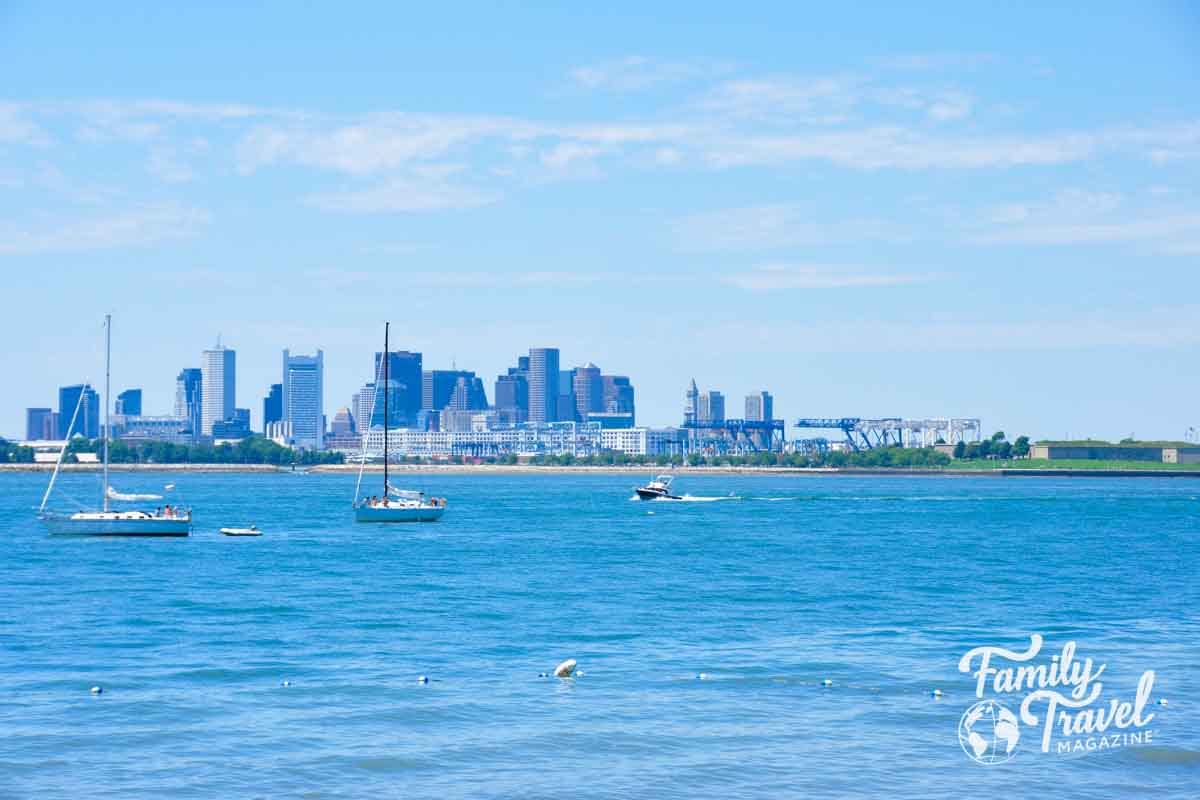 Boston from the Boston Harbor with boats in foreground