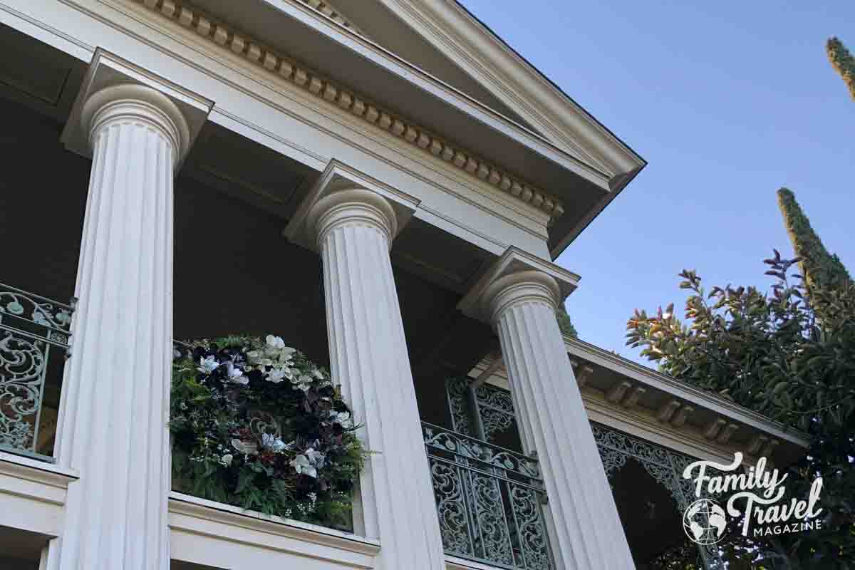 Pillars and wreaths on building