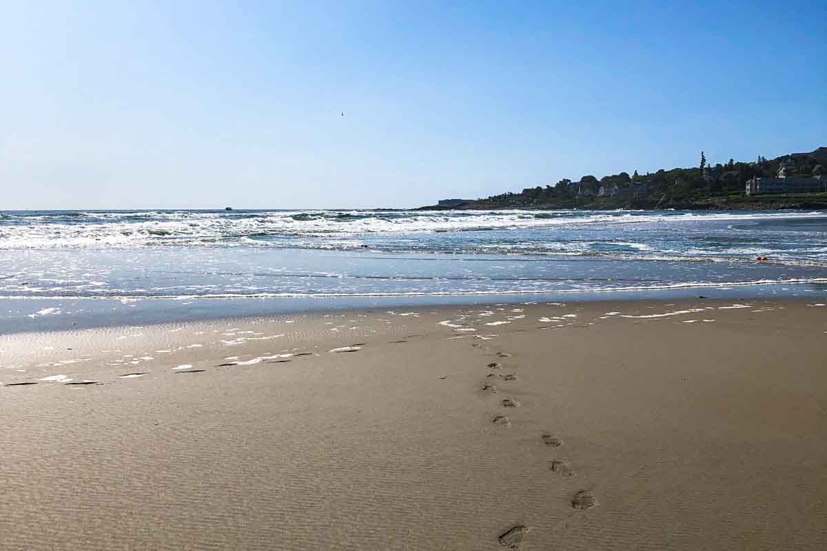 Beach with footprints in the sand