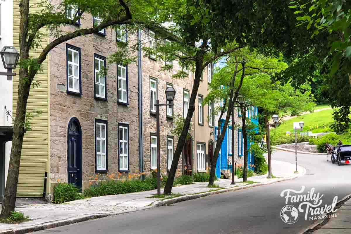 Street in Quebec City with horse and carriage in the corner