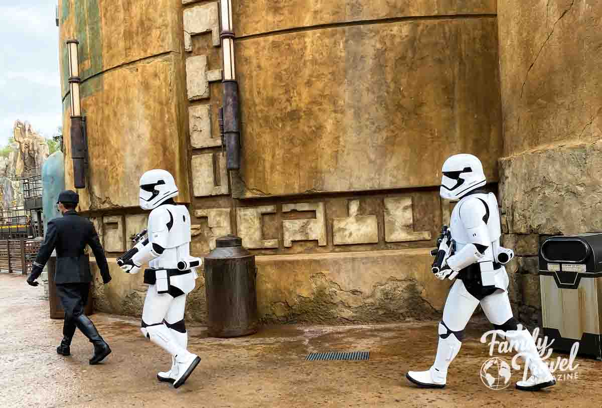 Storm Troopers walking in Star Wars Galaxy's Edge. 