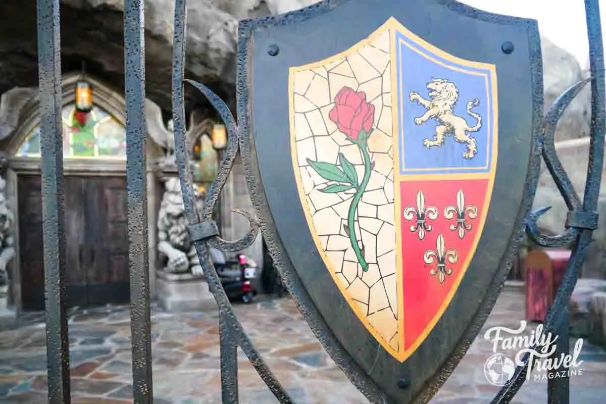 Fence with a crest on it 