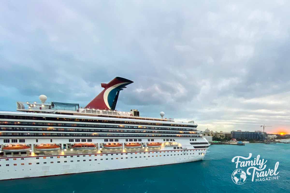 Carnival Cruise Ship docked with sunset in background