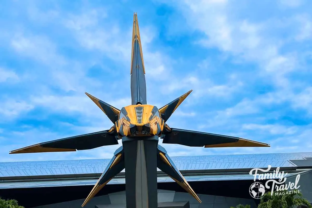 Futuristic star figure in front of Cosmic Rewind at EPCOT