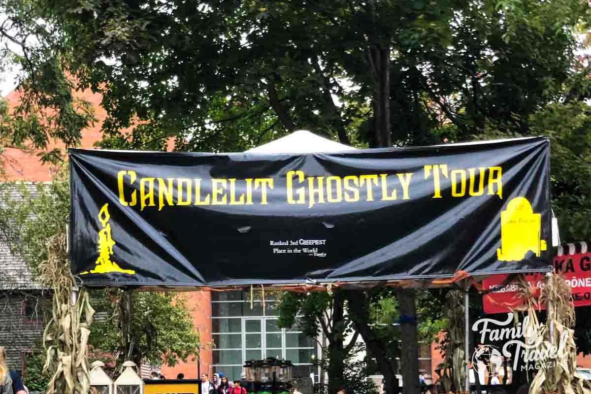 Candlelit Ghostly Tour booth in Salem