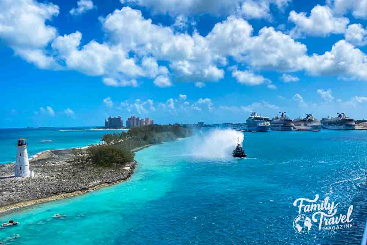 Multiple ships docked at Nassau with Atlantis in the background