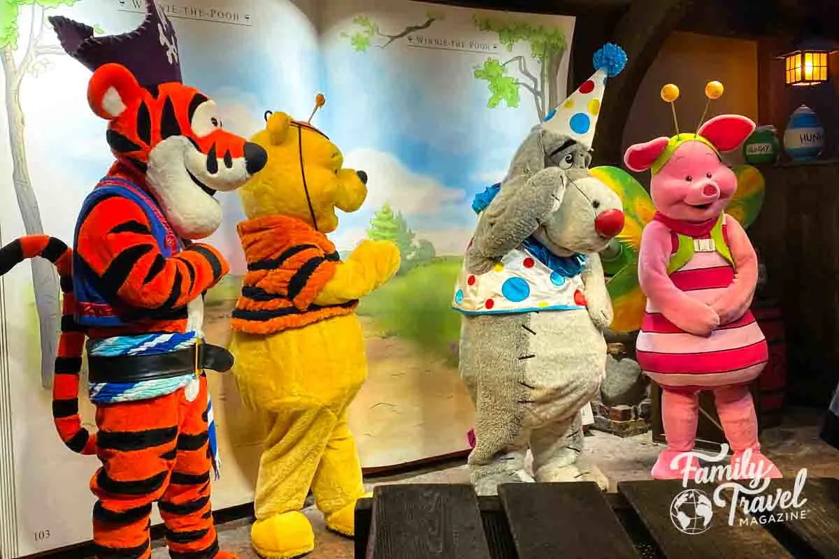 Tigger, Pooh, Eeyore, and Piglet in Halloween costumes 