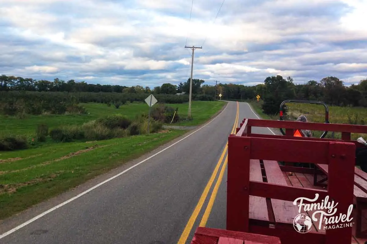 Red hayride wagon on the road