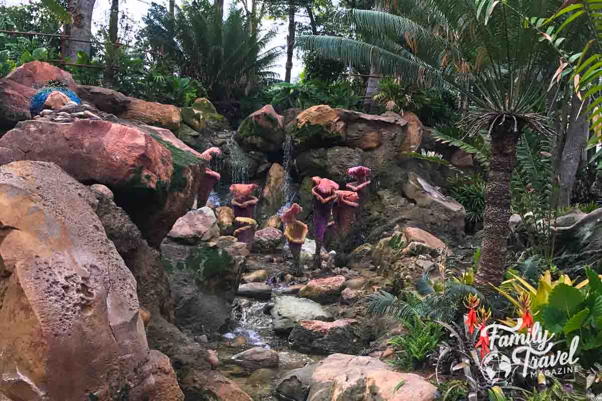 Colorful rocks and plants by a stream at Pandora