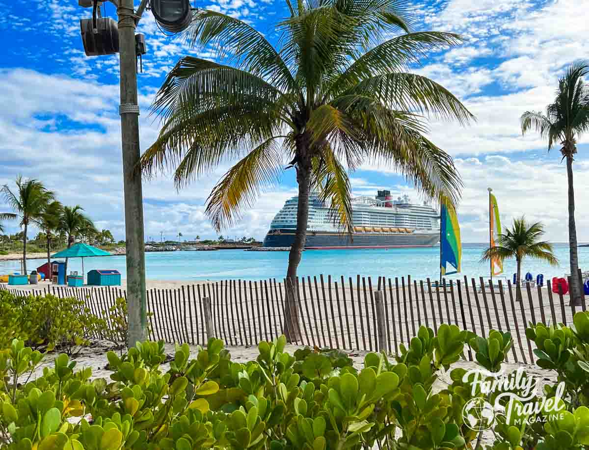 Ship docked at Castaway with water sports in the foreground