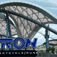 Tron ride roof with the TRON sign in front.