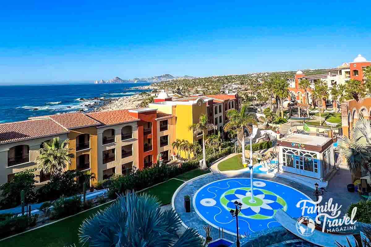 View of bright colored resort on the waterfront from above