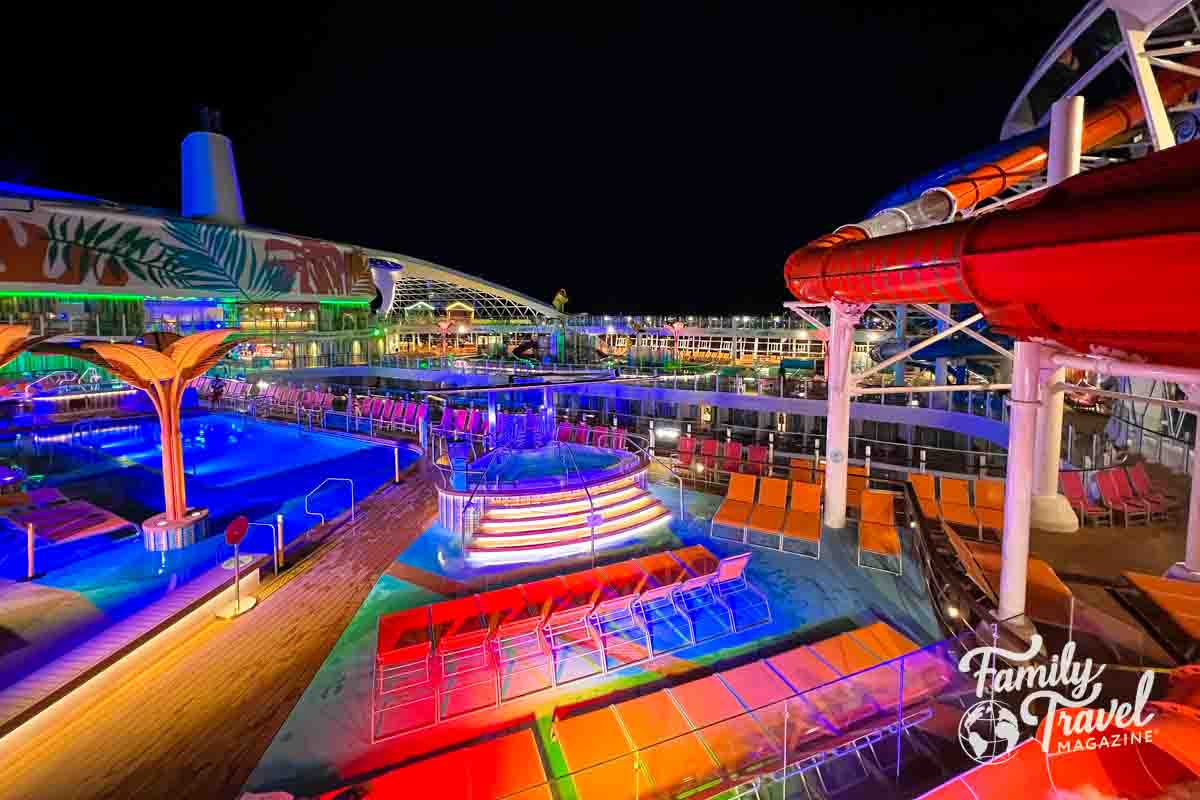 Pool deck on Utopia of the Seas at night