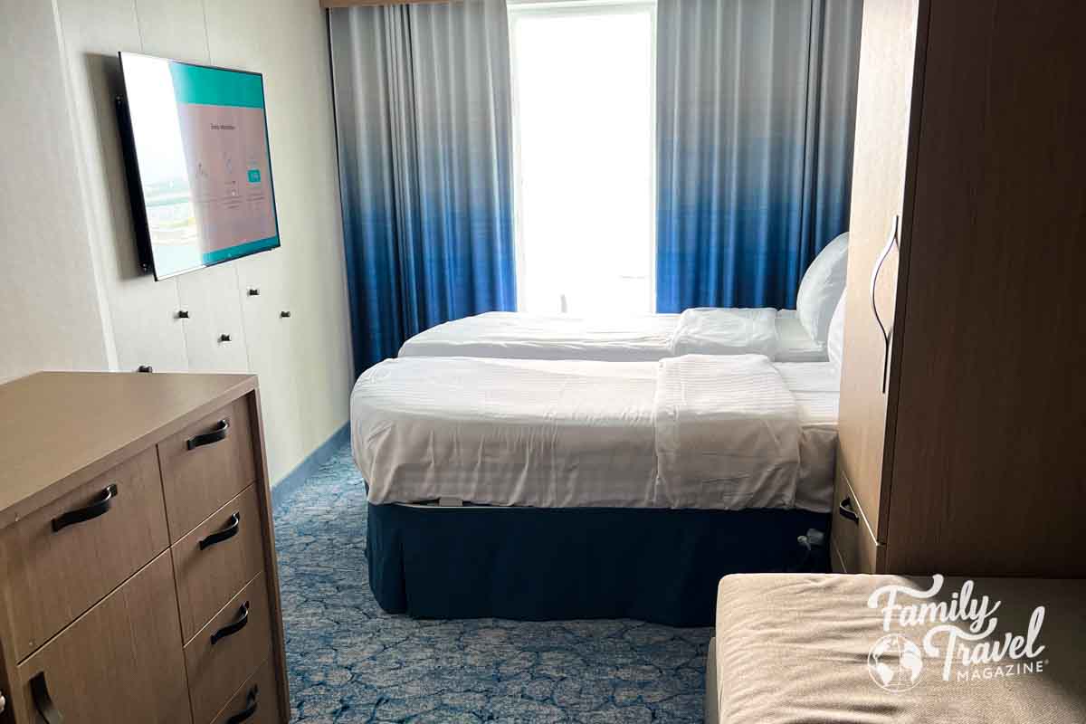 Stateroom with bed split into two twins