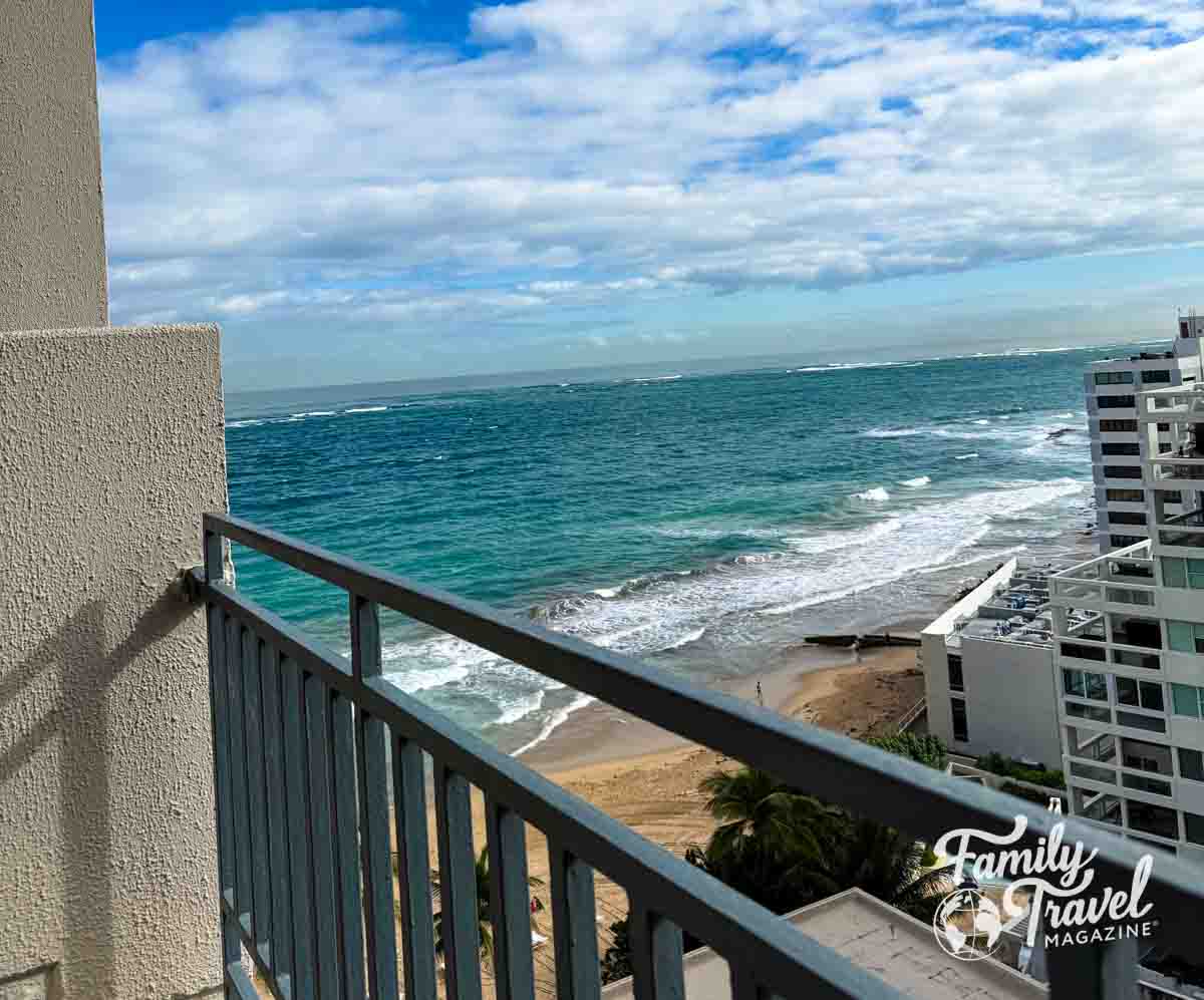 partial view of a beach from a balcony